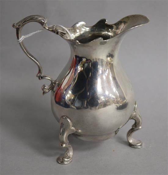 A George II silver cream jug, London, 1742, 10.8cm.